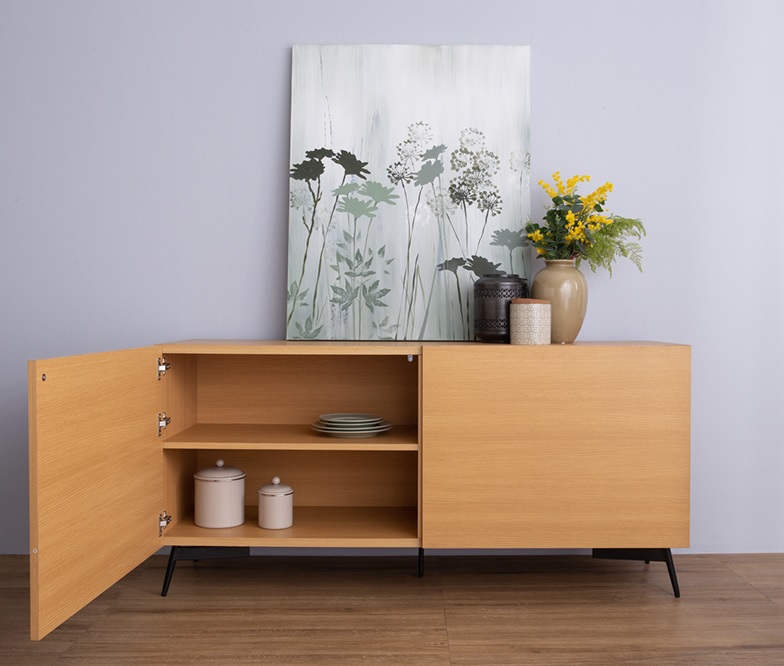 Brown cabinet with 2 doors, shelves and sturdy metal legs.