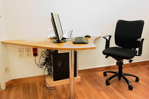 Wooden study table with cable holes 
