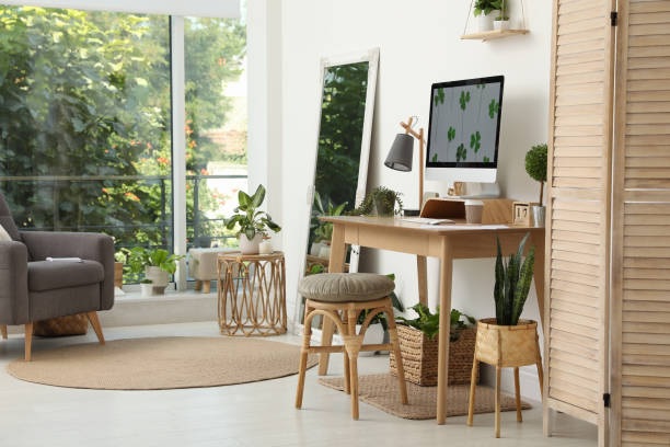 Study room with plants and wooden furniture