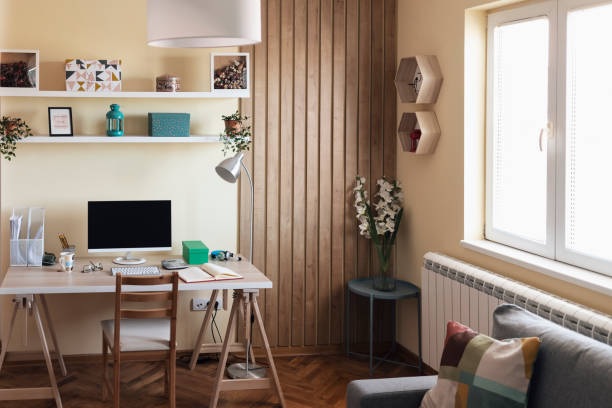 Wooden study table with cable holes 